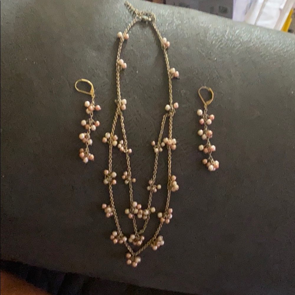 Unbranded beaded necklace and pierced earrings.